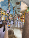 Inside the Tay Ninh Holy See, with a lot of tourists trying to take photos